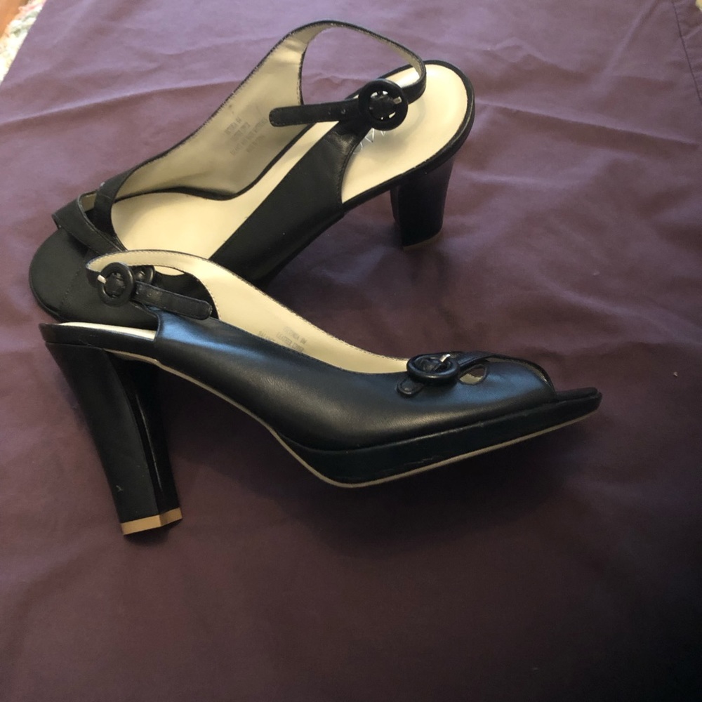 Peep toe pumps. Genuine leather, New.
